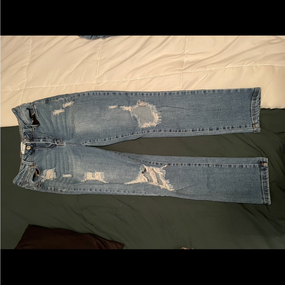 Distressed Blue Denim Jeans